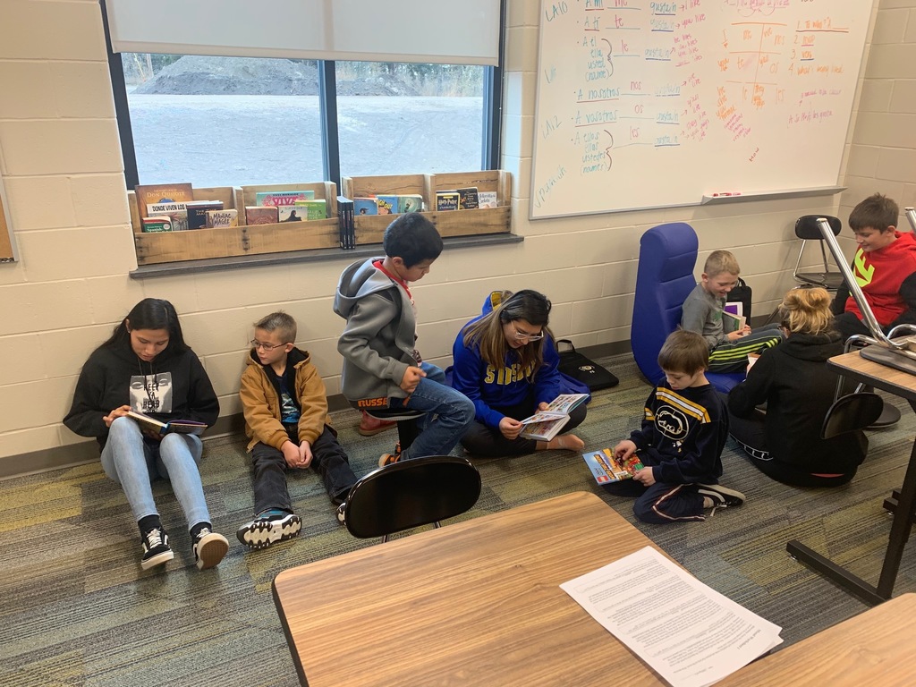 HS Students Reading to Elementary Students